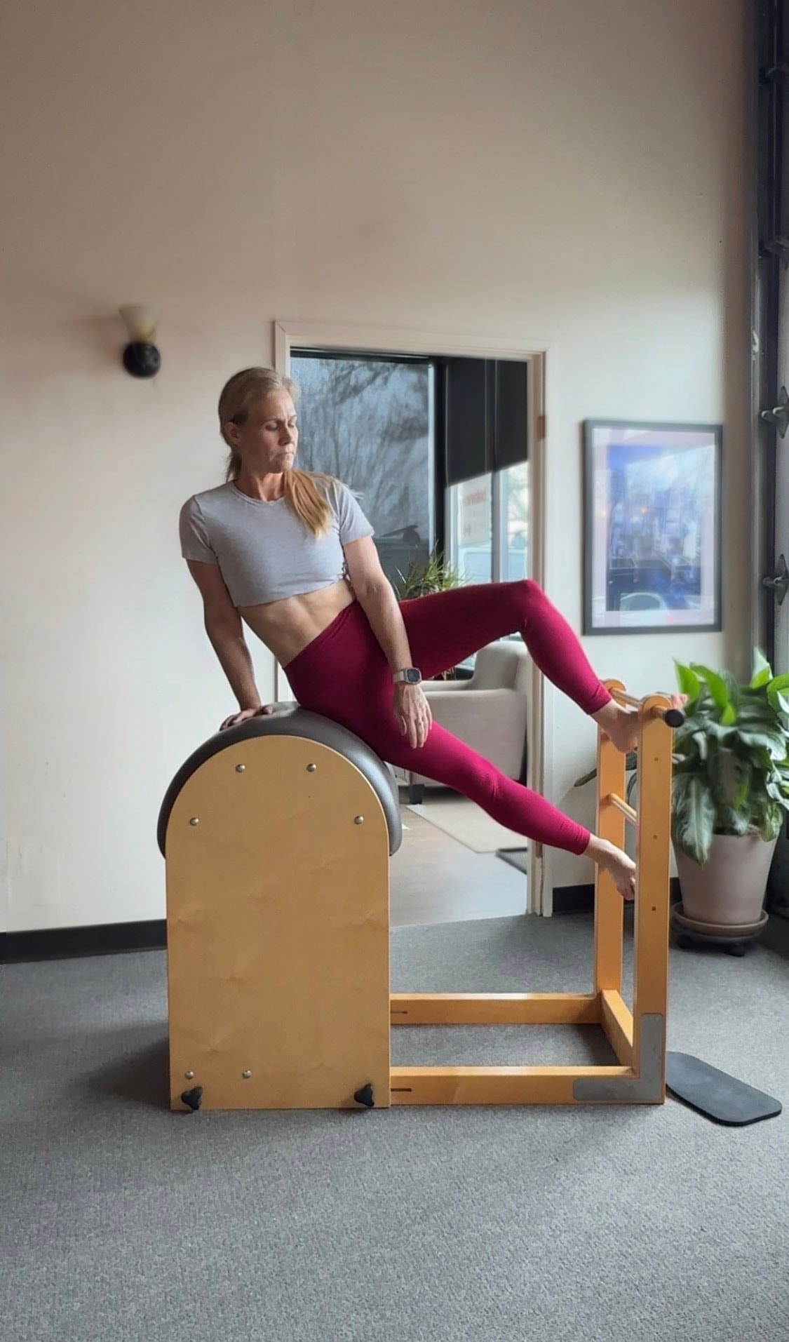 Bright airy Pilates studio interior with reformer equipment